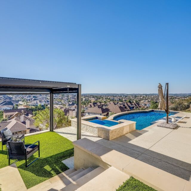 JUST LISTED! 
18101 Heard Loop

4 BD | 3.5 BA 
Offered for $1,200,000
Listed by @meredithalderson.heyday

Perched on a hill in the gated Davenport Summit of Sweetwater, this modern home offers both style and functionality. With contemporary updates throughout, it’s move-in ready. Enjoy panoramic hill country views from two terraces and a custom-built pool, perfect for indoor-outdoor living. The main floor feels like a single-story home, featuring three spacious bedrooms, a dedicated office, and an open-concept living area with high ceilings and large windows. Upstairs, a versatile bonus room with a full bath and private balcony can serve as a fourth bedroom, game room, or office. The three-car garage includes a home gym in one bay. Outside, enjoy a built-in grill, custom pool and spa (added in 2023), a pergola, and low-maintenance turf. Sweetwater amenities, including pools, sports courts, and trails, are nearby, along with top-rated Lake Travis Schools.